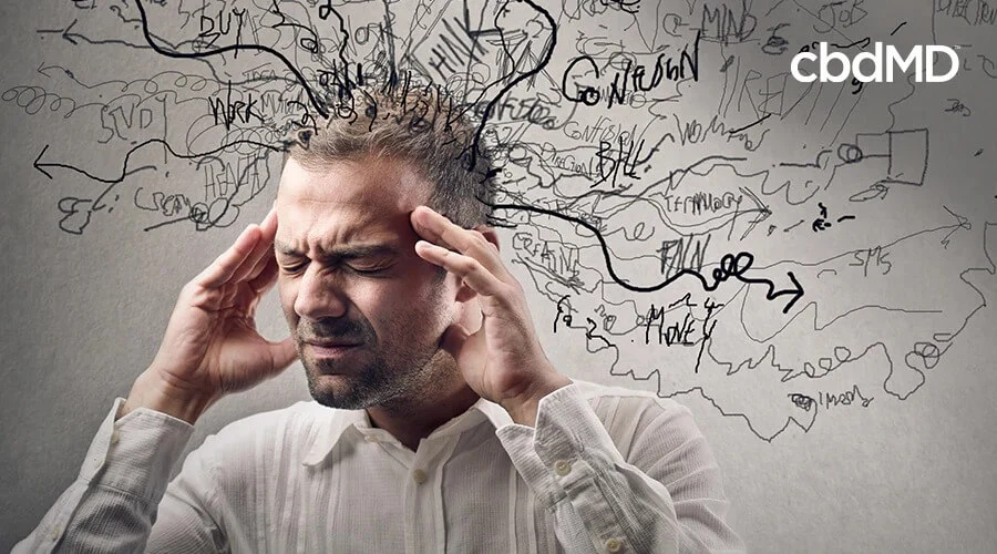 stressed out man with stressful thoughts coming from his head