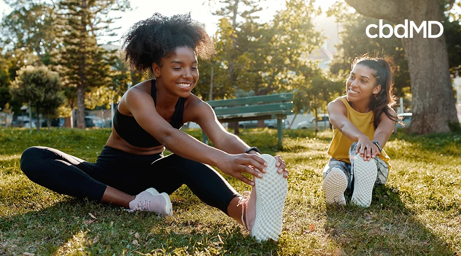 women stretching post workout