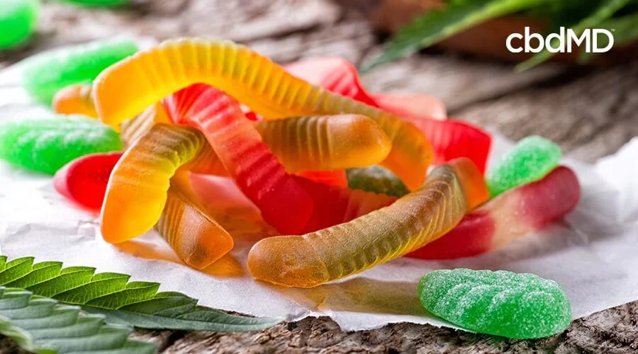 Various cbd gummies with cannabis leaves around them