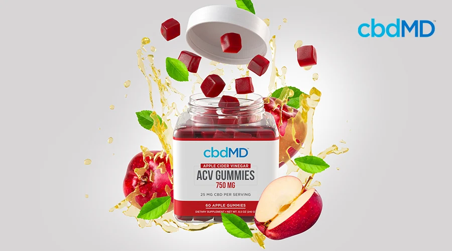 cbdMD apple cider vinegar acv gummies 750mg apple container with gummies flying out the top with apples around the container as well as apple juice splashing outward