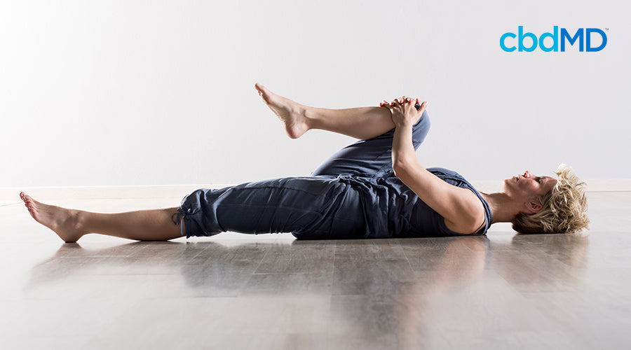 woman stretching leg before post workout