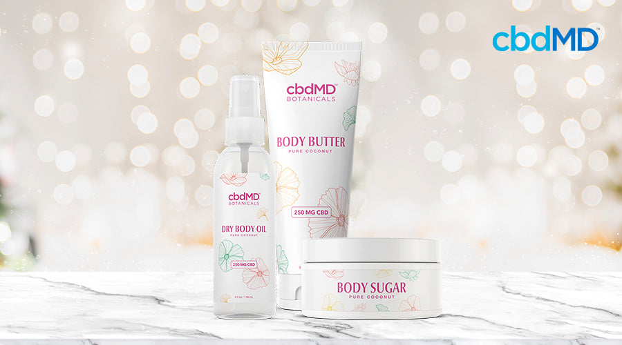 cbdMD botanicals dry body oil, body butter, and body sugar pure coconut containers.