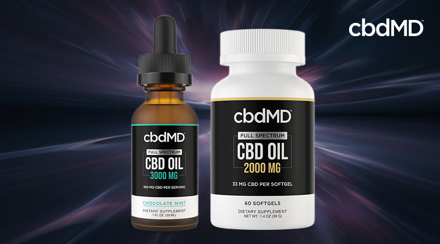 cbdMD full spectrum oil and softgel bottles.