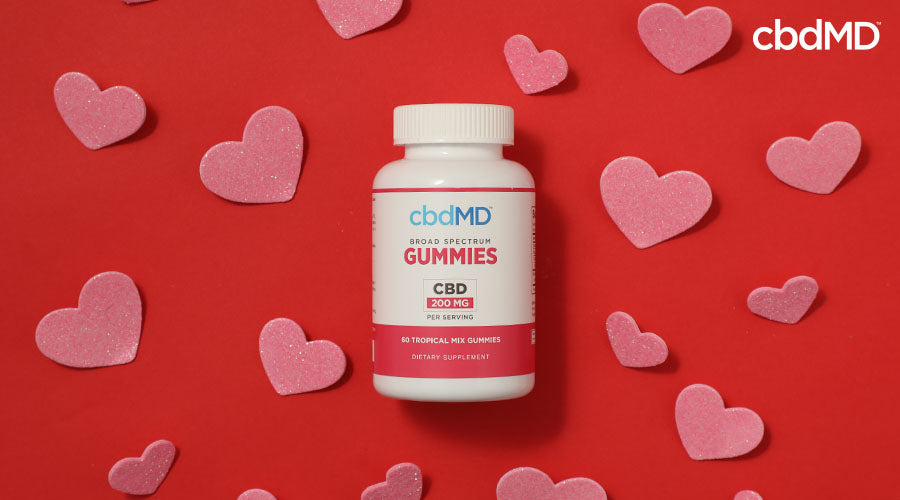 Broad spectrum cbd gummies 200 mg cbd per serving tropical mix with hearts around it - cbdMD