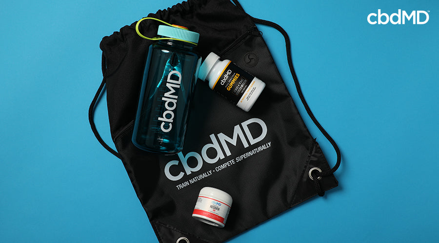 Active cbd bundle with water bottle full spectrum gummies cbd plus thc tropical twist and recover cbd cream next to each other - cbdMD