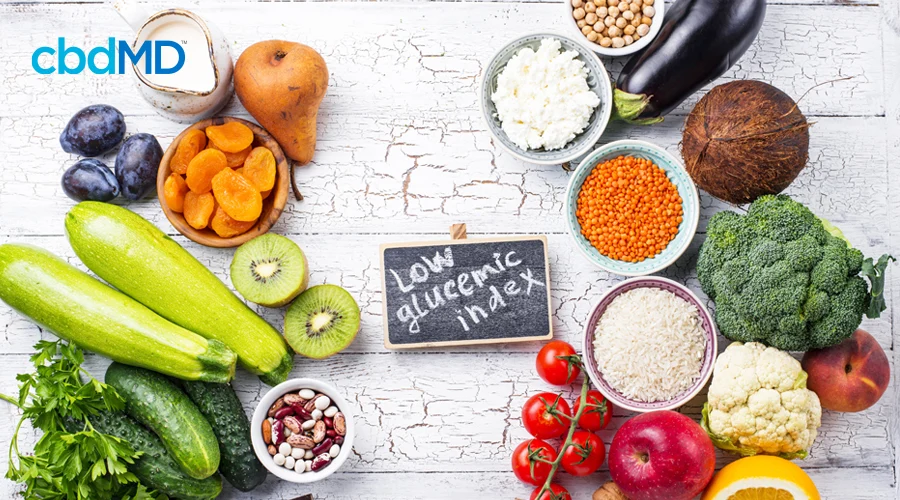 A large assortment of fruits, veggies, and nuts that are skin power foods sits all together