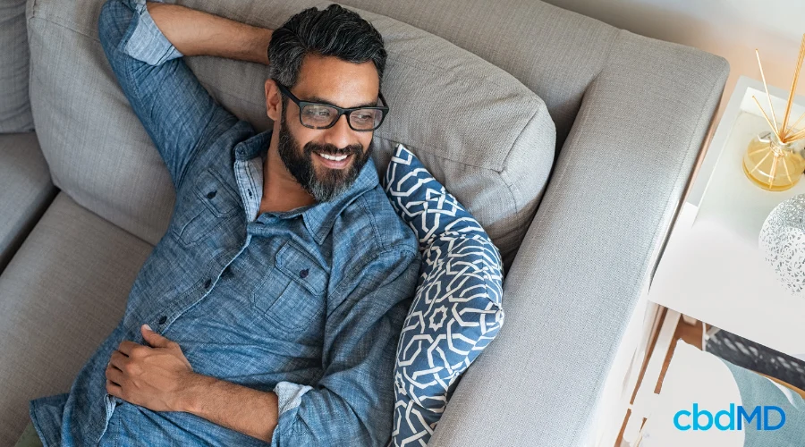 Happy Man Relaxing After Taking CBD for Mental Health