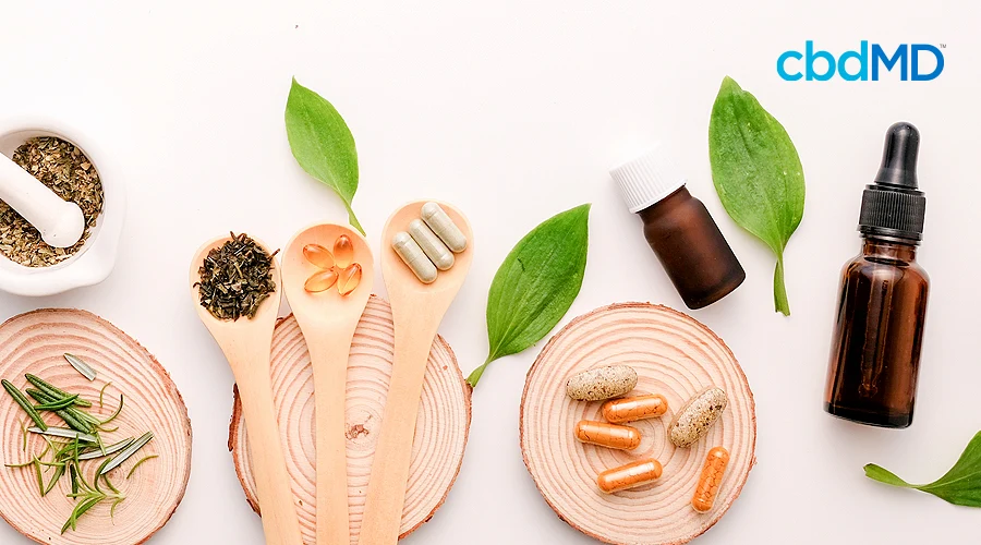 An assortment of healthy supplements and cbd products sits on a counter