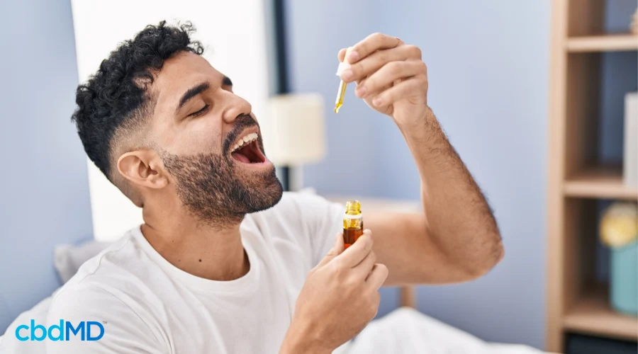 Man Starting Morning with Daily CBD Tincture