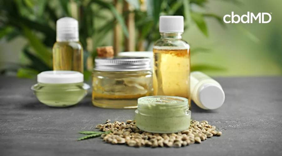 A variety of hemp derived plant products sit next to each other on a table
