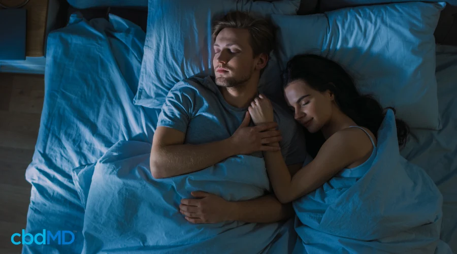 Relaxed Couple in Bed for Healthy Sleeping Habits