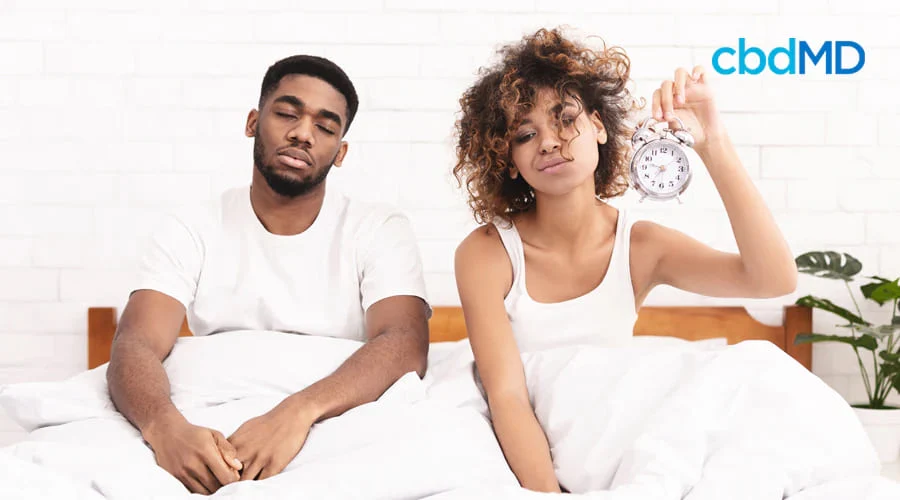 Woman and Man in Bed Sleep