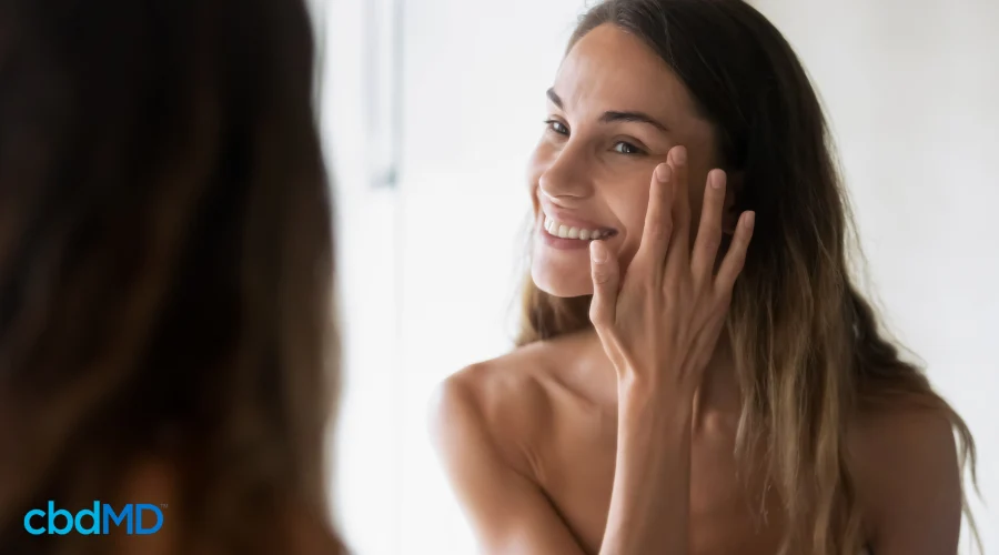 Woman Using CBD Facial Serum in Skincare Routine