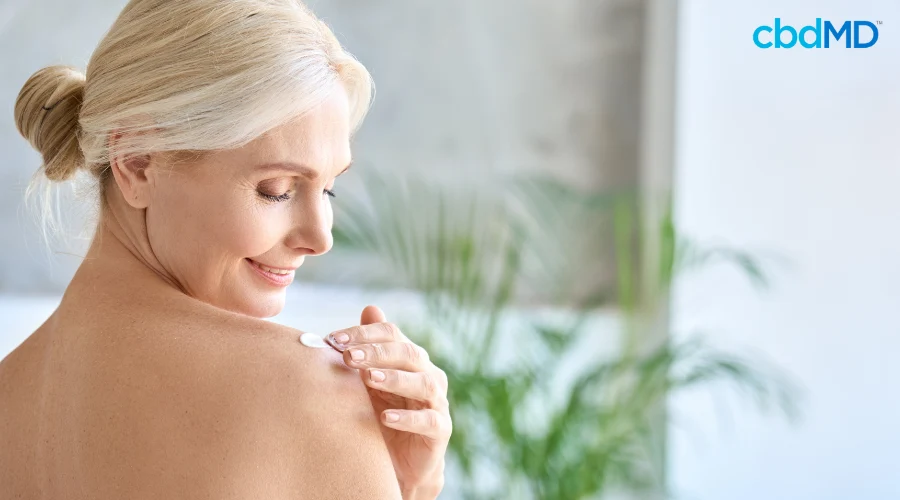 Woman Using Topical for CBD Pain Relief