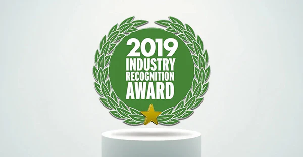 2019 Industry Recognition Award green wreath badge with gold star on white pedestal